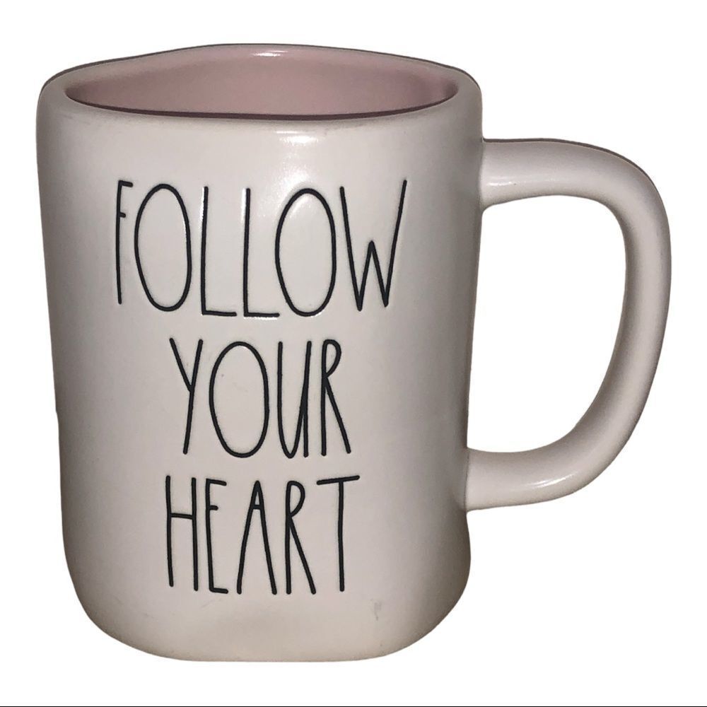 Rae Dunn FOLLOW YOUR HEART mug with light pink interior